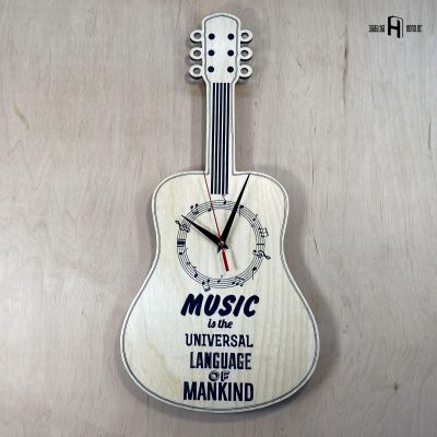 Music is the universal language of mankind (guitar shape)